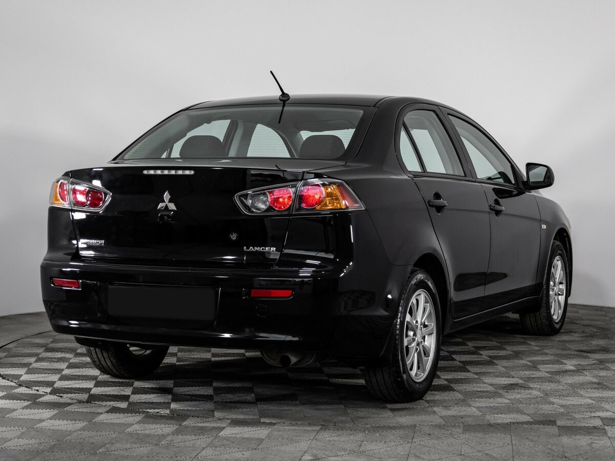 Купить Mitsubishi Lancer с пробегом. Фото: #3