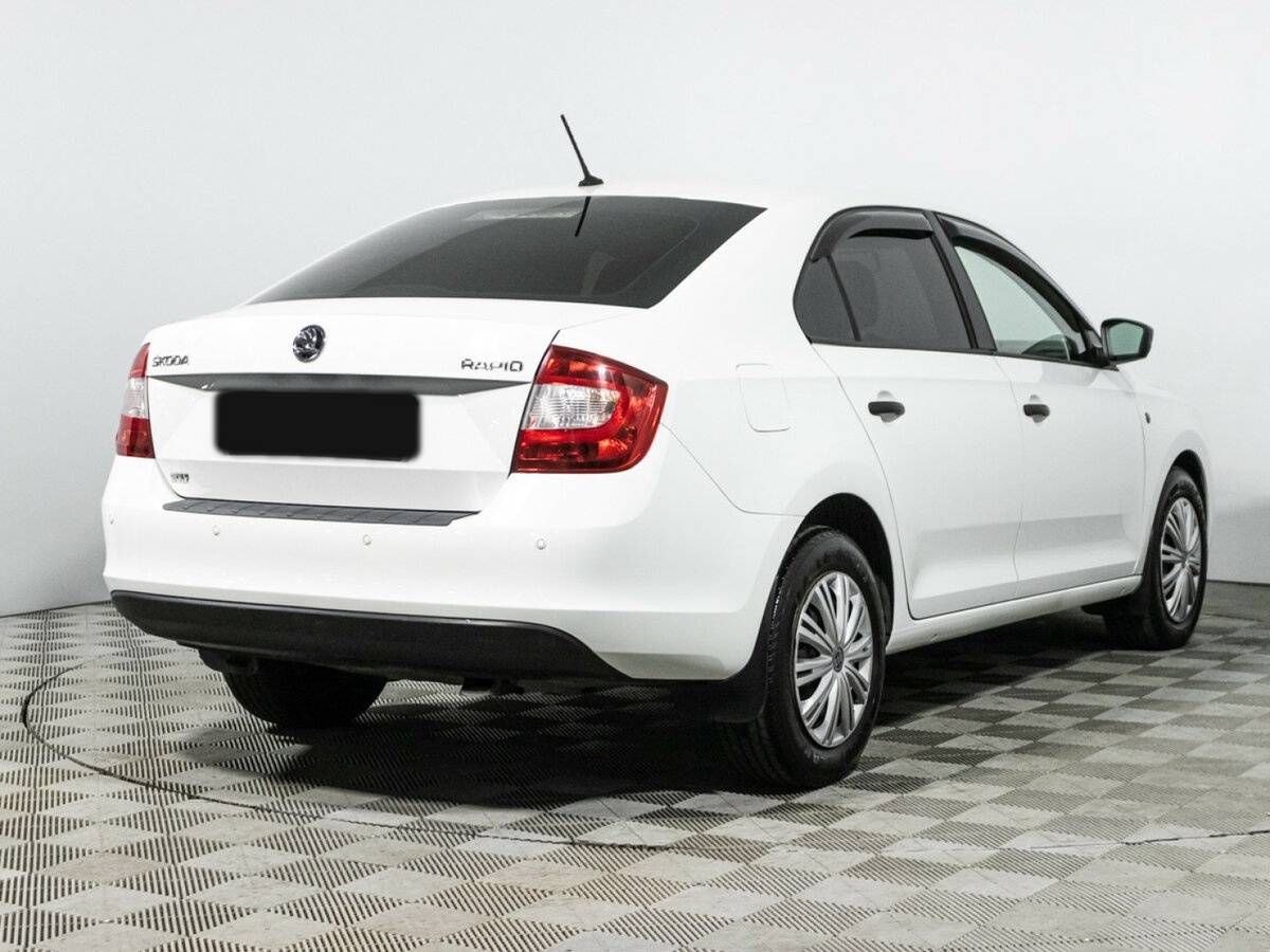 Купить Skoda Rapid с пробегом. Фото: #4